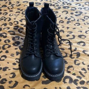 Combat boots I wore maybe three times because they were too big